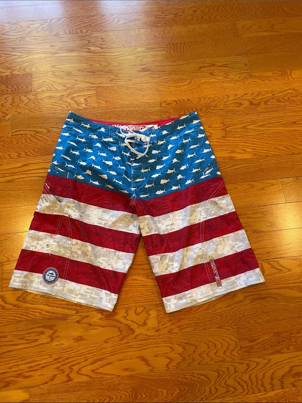 Pelagic Men's Blue Red White American Flag Shark Print Boardshorts